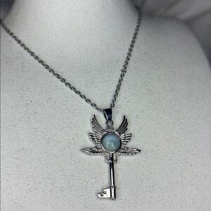 Larimar Silver Key With Wing Style Necklace
